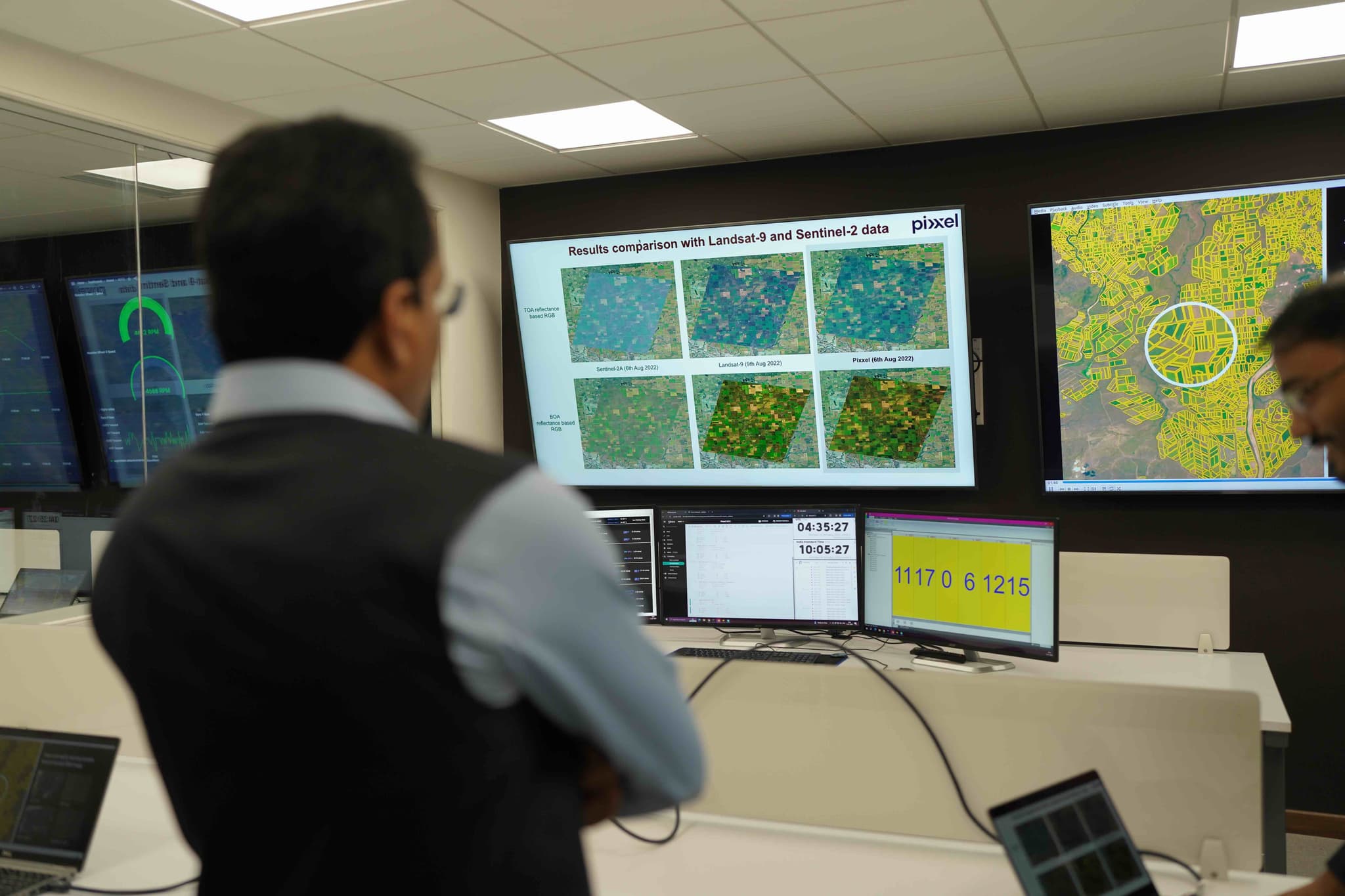 Shri S. Somanath, former Chairman, ISRO, reviewing hyperspectral imagery comparisons during a visit to Pixxel.
