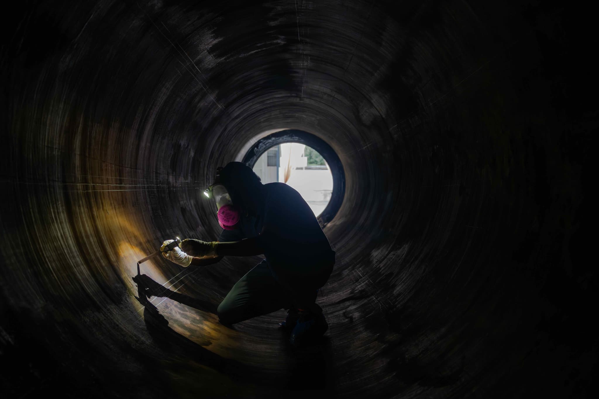 A Skyroot engineer inspecting the Kalam-1200 booster stage post the static fire test.
