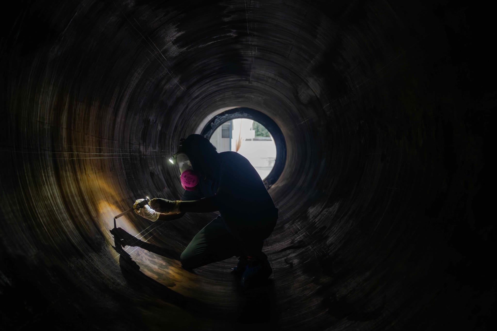 A Skyroot engineer inspecting the Kalam-1200 booster stage post the static fire test.